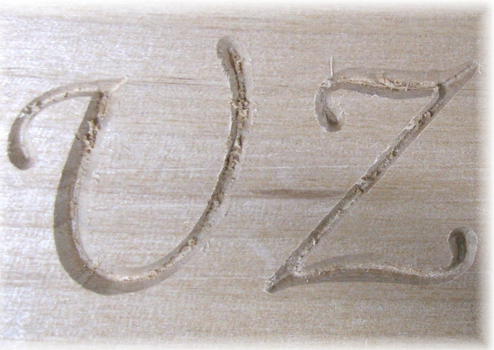 Debris in 60 degree engraved letter